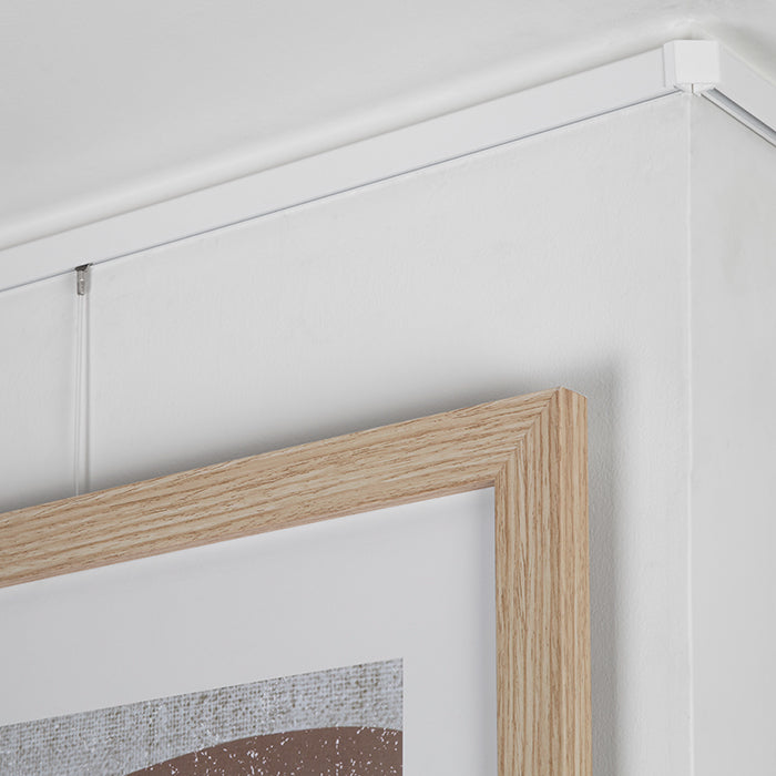 STAS minirail + installatie kit: de smalste ophangrail ter wereld, ideaal voor flexibele wanddecoratie.