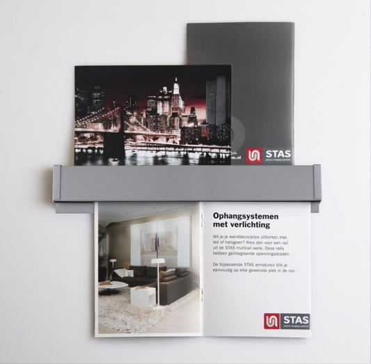 STAS papergrip: een multifunctioneel ophangsysteem voor documenten en kaarten.